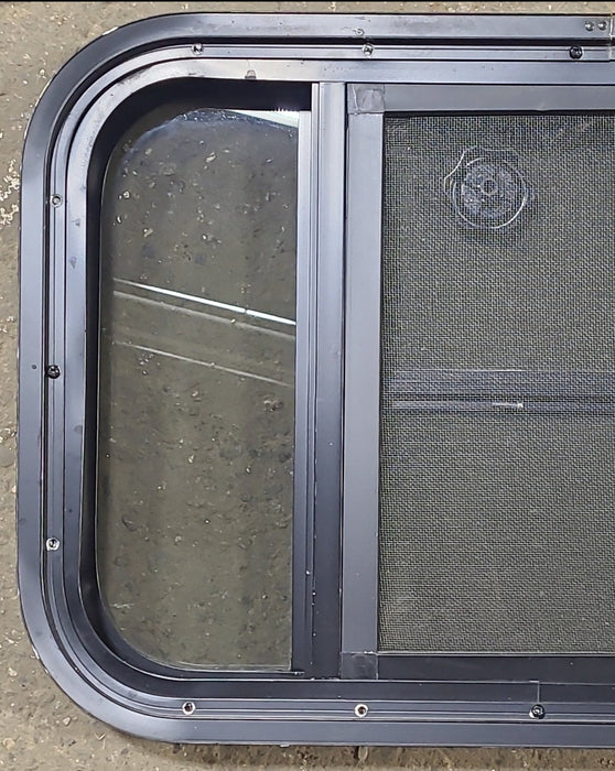 Used Black Radius Opening Window : 23 3/8" W x 15 1/2" H x 1 7/8" D