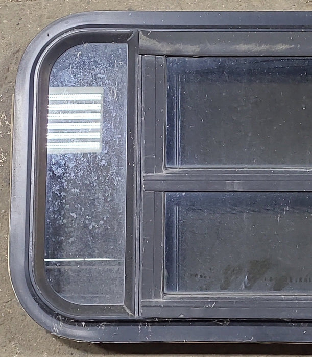 Used Black Radius Opening Window : 23" W x 14 1/8" H x 1 3/4" D