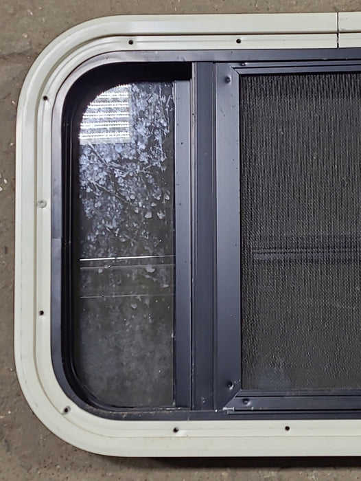 Used Black Radius Opening Window : 23" W x 14 1/8" H x 1 3/4" D