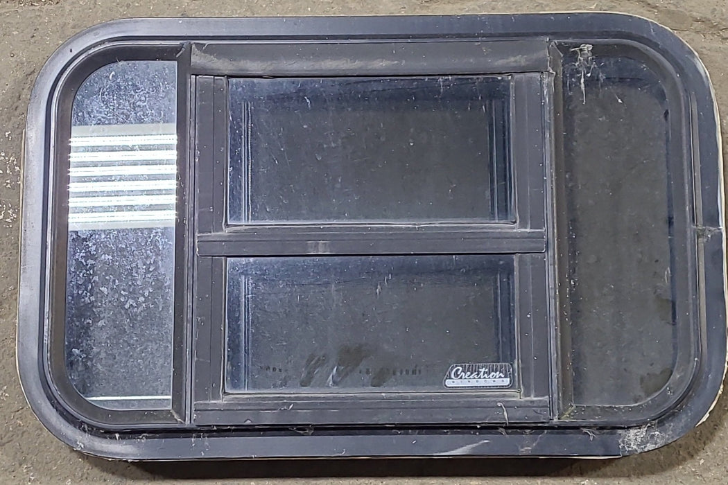 Used Black Radius Opening Window : 23" W x 14 1/8" H x 1 3/4" D