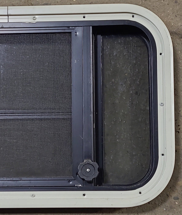 Used Black Radius Opening Window : 23" W x 14 1/8" H x 1 3/4" D