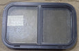 Used Black Radius Opening Window : 24 1/2" W x 15" H x 1 7/8" D - Young Farts RV Parts