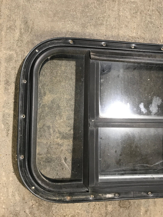 Used Black Radius Opening Window : 24 1/2" W x 16" H x 1 1/2"