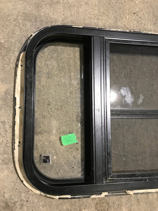 Used Black Radius Opening Window : 24 1/2" W x 16" H x 1 1/2"