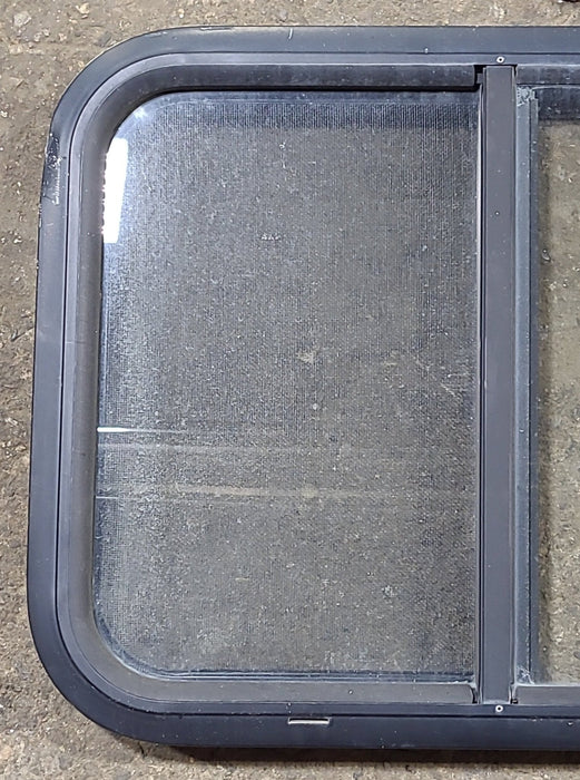 Used Black Radius Opening Window : 24 1/2" W x 17 3/4" H x 1 3/4" D