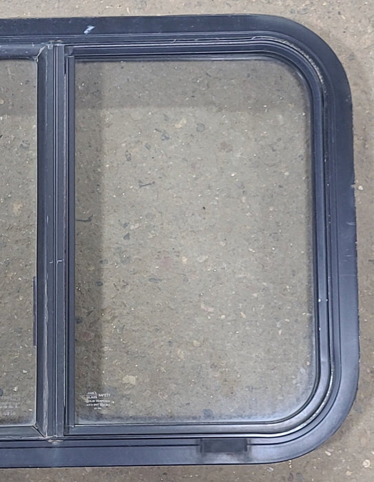 Used Black Radius Opening Window : 24 1/2" W x 17 3/4" H x 1 3/4" D