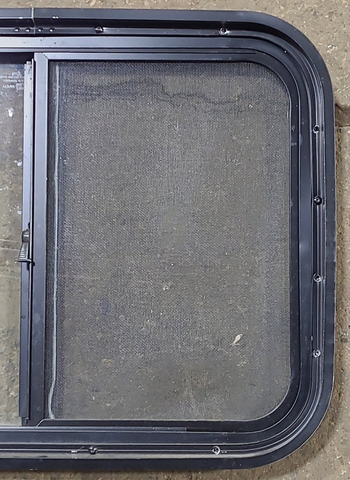 Used Black Radius Opening Window : 24 1/2" W x 17 3/4" H x 1 3/4" D