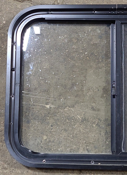 Used Black Radius Opening Window : 24 1/2" W x 17 3/4" H x 1 3/4" D