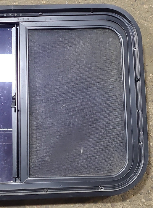 Used Black Radius Opening Window : 24 1/2" W x 17 3/4" H x 1 3/4" D