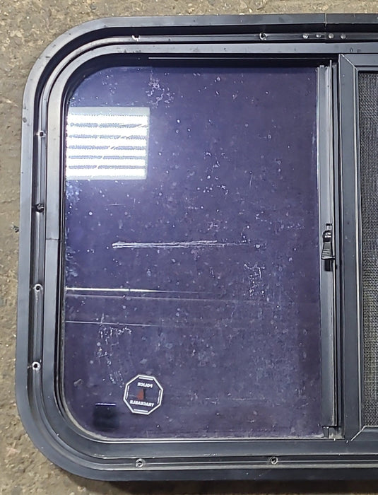 Used Black Radius Opening Window : 24 1/2" W x 17 3/4" H x 1 3/4" D