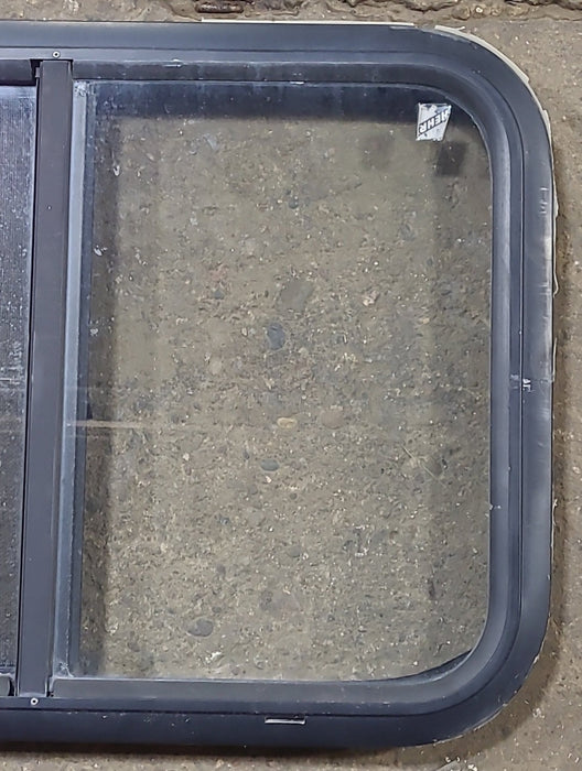 Used Black Radius Opening Window : 24 1/2" W x 17 3/4" H x 1 3/4" D