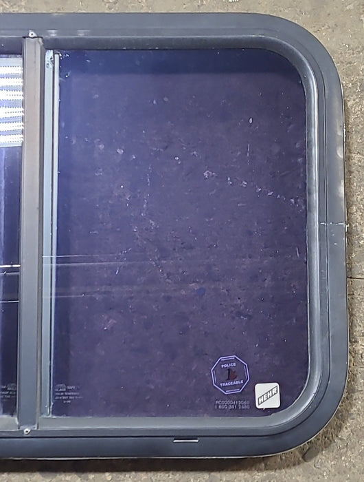 Used Black Radius Opening Window : 24 1/2" W x 17 3/4" H x 1 3/4" D