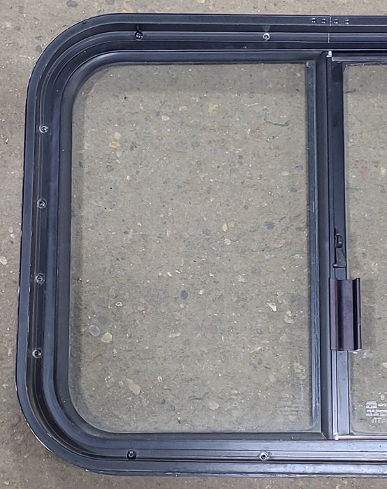 Used Black Radius Opening Window : 24 1/2" W x 17 3/4" H x 1 3/4" D