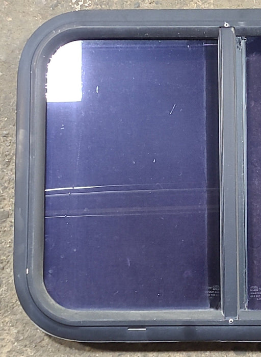 Used Black Radius Opening Window : 24 1/2" W x 17 3/4" H x 1 3/4" D