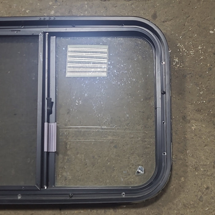 Used Black Radius Opening Window : 24 1/2" W x 18" H x 1 3/4" D