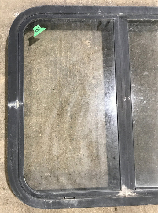 Used Black Radius Opening Window : 24 1/2" W x 21 1/2" H x 1 7/8" D