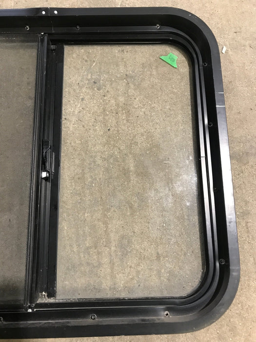 Used Black Radius Opening Window : 24 1/2" W x 21 1/2" H x 1 7/8" D
