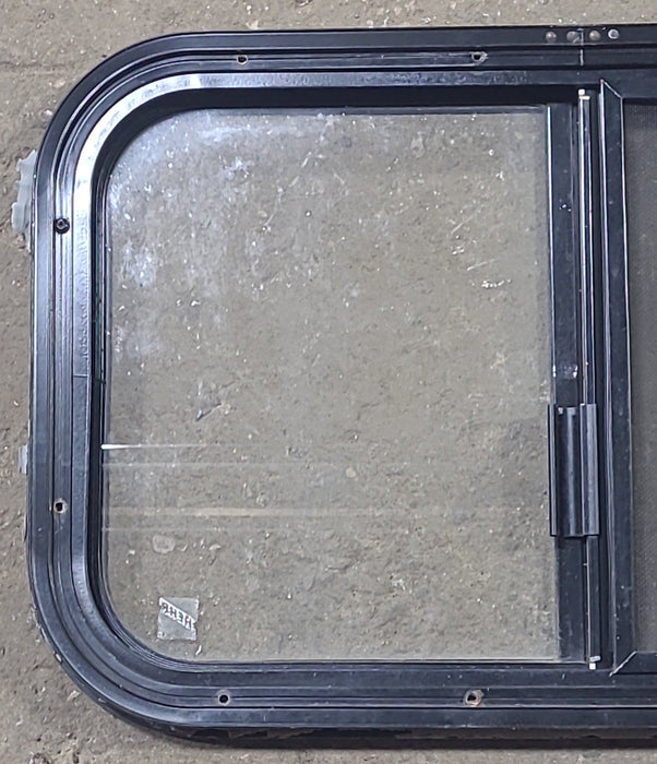 Used Black Radius Opening Window : 24 1/4" W x 14 3/4" H x 1" D