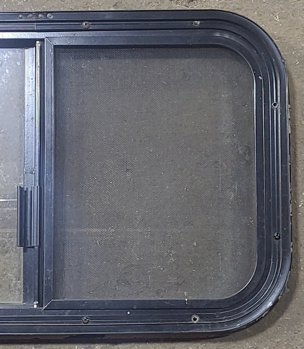 Used Black Radius Opening Window : 24 1/4" W x 14 3/4" H x 1" D