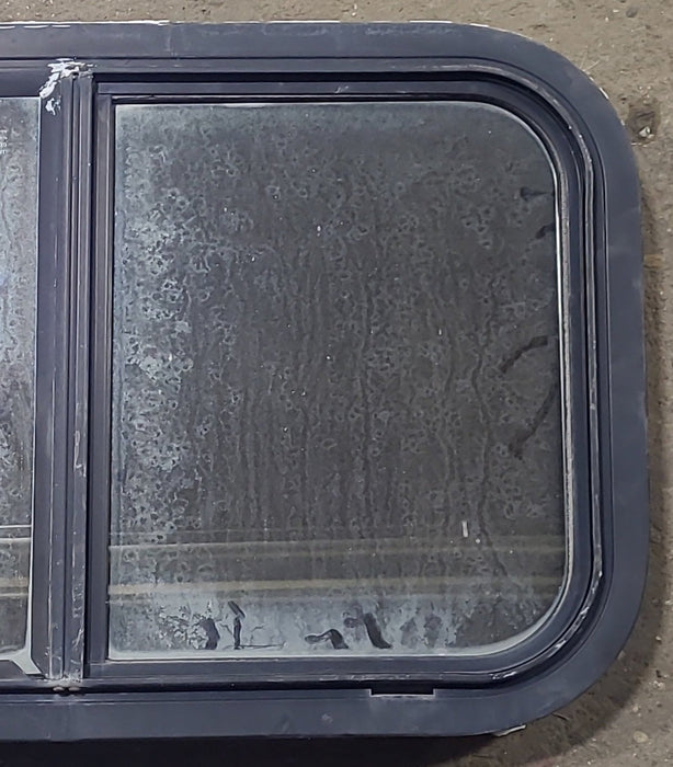 Used Black Radius Opening Window : 24 1/4" W x 14 3/4" H x 2" D