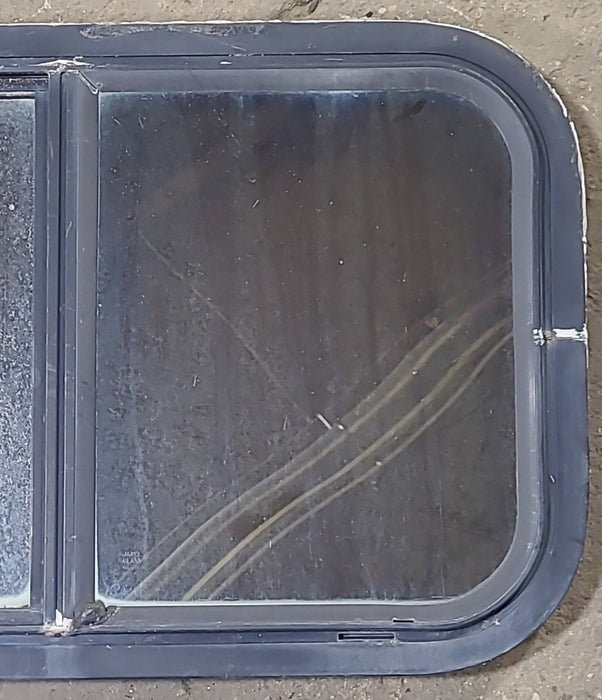 Used Black Radius Opening Window : 24 1/4" W x 14 3/4" H x 2" D