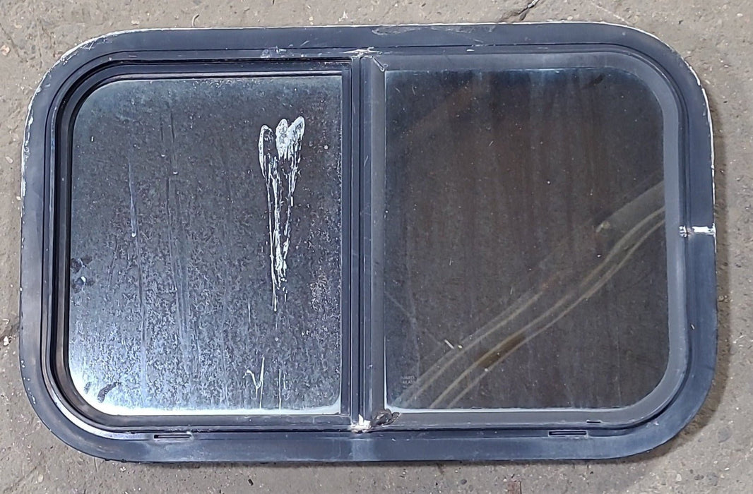 Used Black Radius Opening Window : 24 1/4" W x 14 3/4" H x 2" D