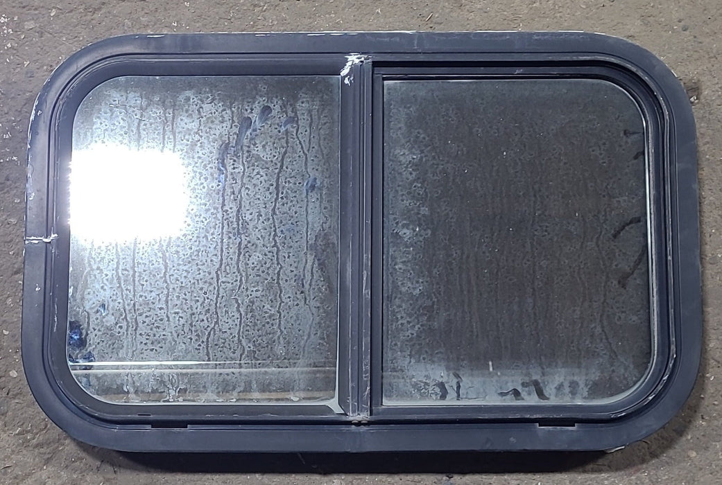 Used Black Radius Opening Window : 24 1/4" W x 14 3/4" H x 2" D