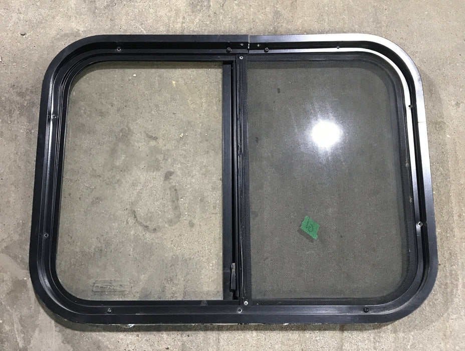 Used Black Radius Opening Window : 24 1/4" W x 17 3/4" H x 1 1/4"
