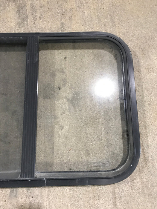 Used Black Radius Opening Window : 24 1/4" W x 17 3/4" H x 1 1/4"