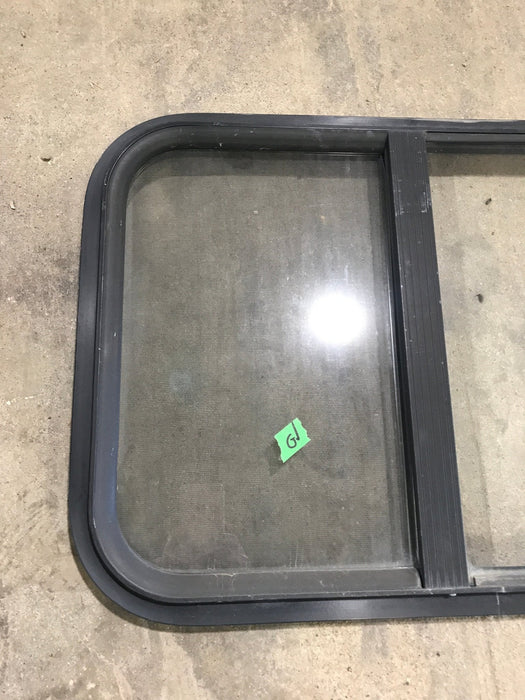 Used Black Radius Opening Window : 24 1/4" W x 17 3/4" H x 1 1/4"