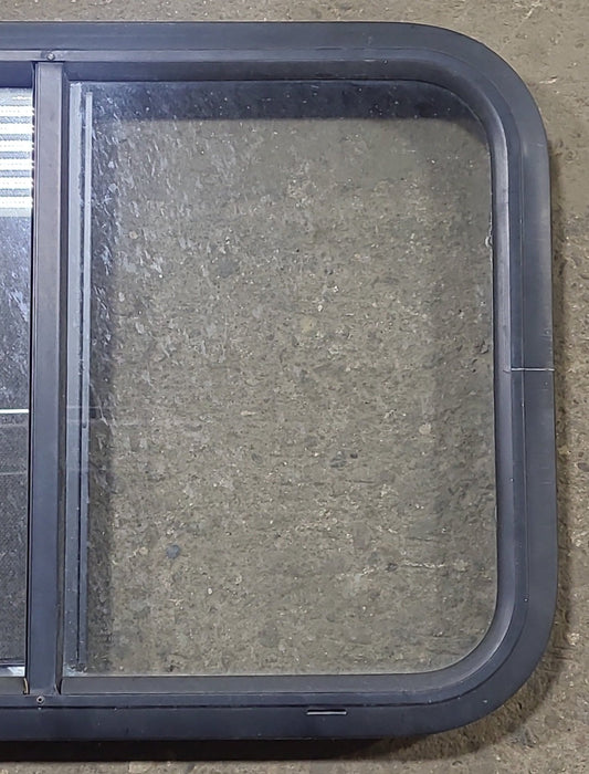 Used Black Radius Opening Window : 24 1/4" W x 17 3/4" H x 1 7/8" D