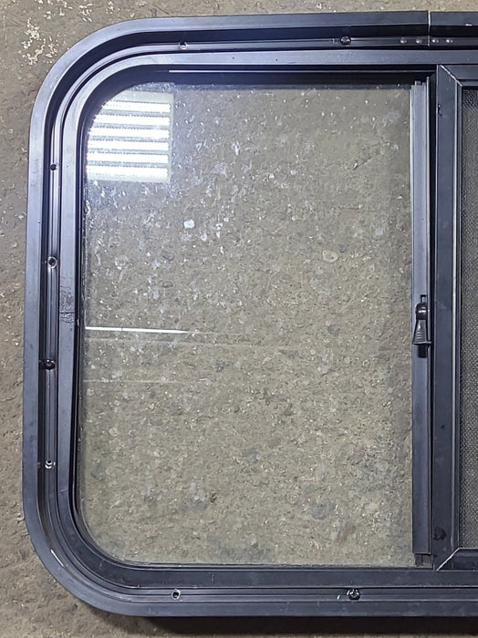 Used Black Radius Opening Window : 24 1/4" W x 17 3/4" H x 1 7/8" D