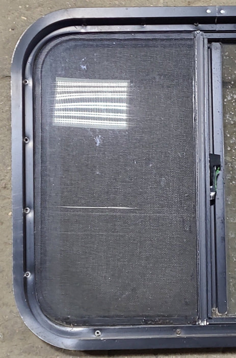 Used Black Radius Opening Window : 24 1/4" W x 19 3/4" H x 1 3/4" D