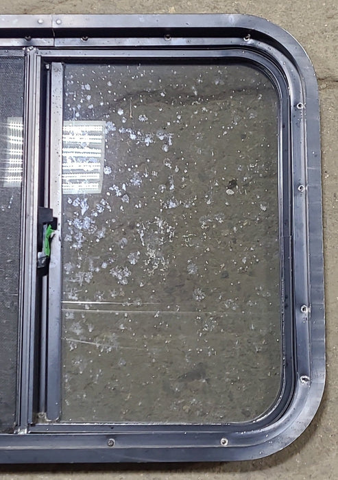 Used Black Radius Opening Window : 24 1/4" W x 19 3/4" H x 1 3/4" D