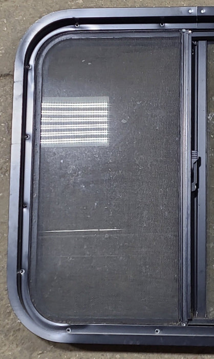 Used Black Radius Opening Window : 24 1/4" W x 21 3/4" H x 1 3/4" D
