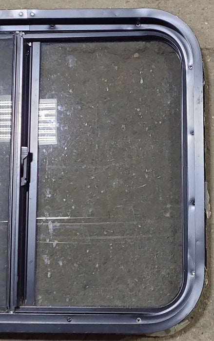 Used Black Radius Opening Window : 24 1/4" W x 21 3/4" H x 1 3/4" D
