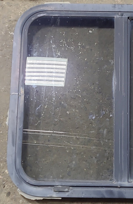 Used Black Radius Opening Window : 24 1/4" W x 21 3/4" H x 1 3/4" D