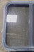 Used Black Radius Opening Window : 24 1/4" W x 21 3/4" H x 1 3/4" D - Young Farts RV Parts