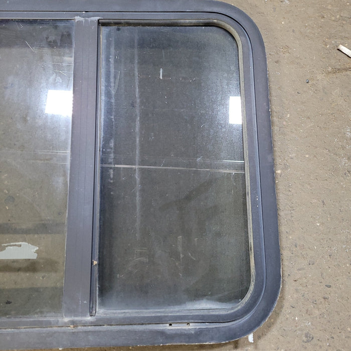 Used Black Radius Opening Window : 24 1/4" X 21 3/4" X 2" D