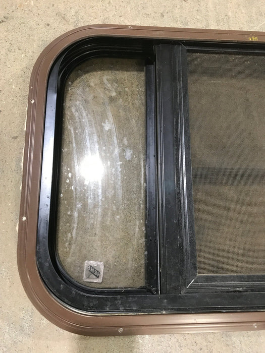 Used Black Radius Opening Window : 24 3/4" W x 15 3/4" H x 1 1/2" D