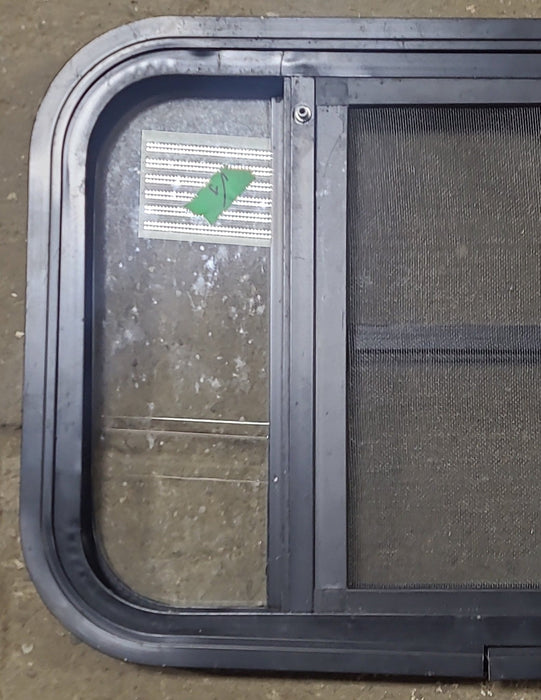 Used Black Radius Opening Window : 24 3/4" W x 16 1/2" H x 1 5/8" D