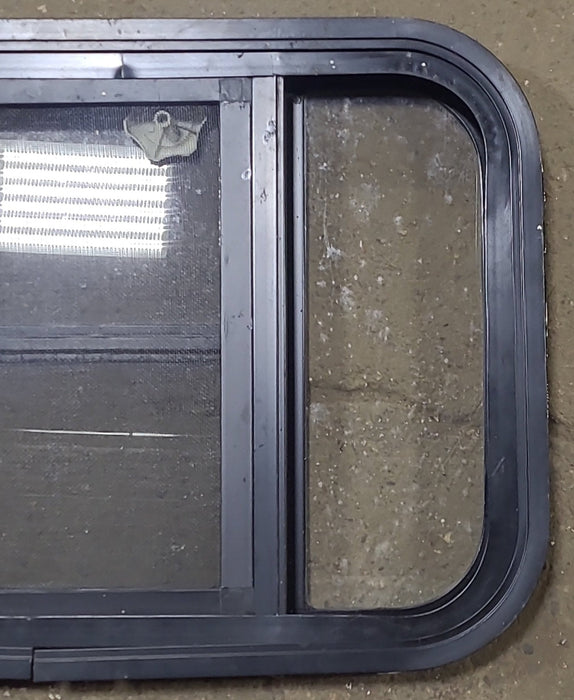 Used Black Radius Opening Window : 24 3/4" W x 16 1/2" H x 1 5/8" D