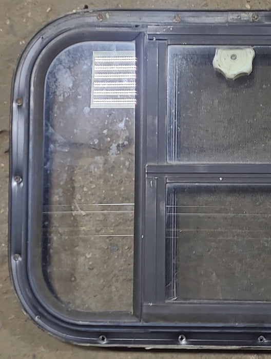 Used Black Radius Opening Window : 24 3/4" W x 16 1/2" H x 1 5/8" D