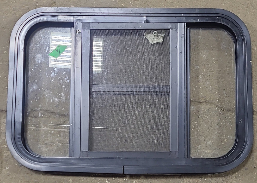 Used Black Radius Opening Window : 24 3/4" W x 16 1/2" H x 1 5/8" D