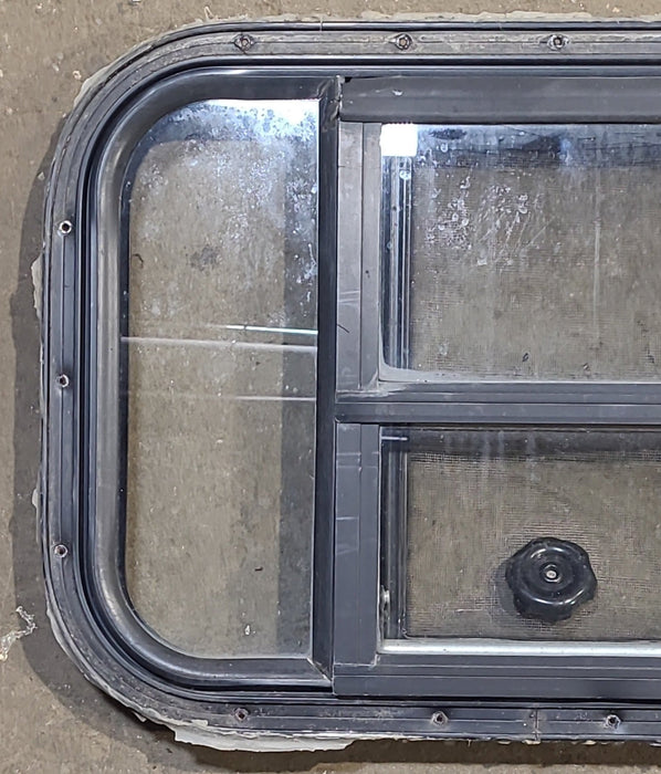 Used Black Radius Opening Window : 24 3/4" W x 16" H x 1 3/8" D