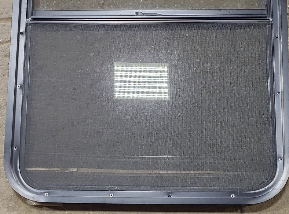 Used Black Radius Opening Window : 26 1/2" W x 39 3/4" H x 1 3/4" D - Young Farts RV Parts