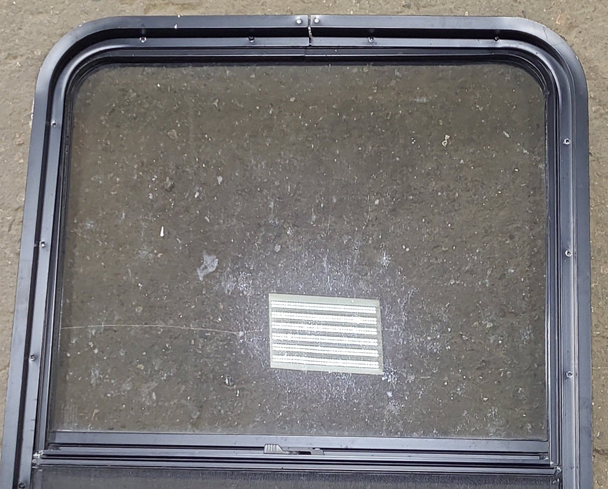 Used Black Radius Opening Window : 26 1/2" W x 39 3/4" H x 1 3/4" D