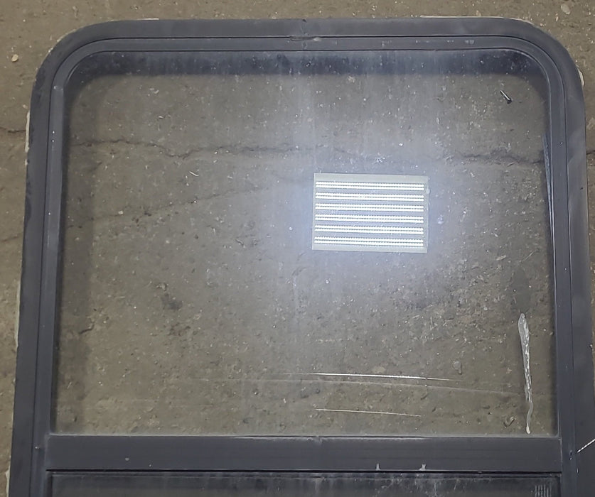 Used Black Radius Opening Window : 26 1/2" W x 39 3/4" H x 1 7/8" D