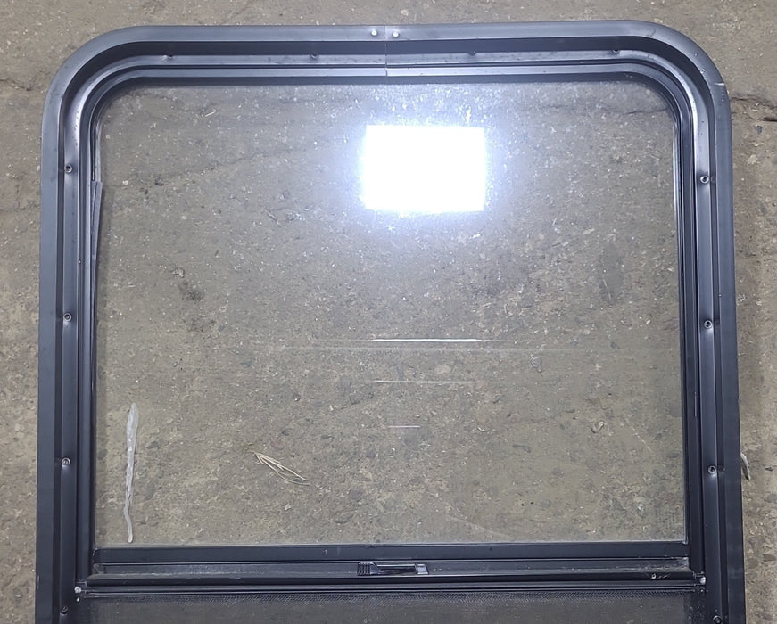 Used Black Radius Opening Window : 26 1/2" W x 39 3/4" H x 1 7/8" D