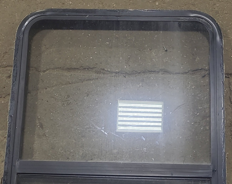 Used Black Radius Opening Window : 26 1/2" W x 39 3/4" H x 1 7/8" D